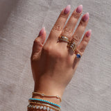 Gold Lab Grown Tanzanite Oval Wave Pinky Ring