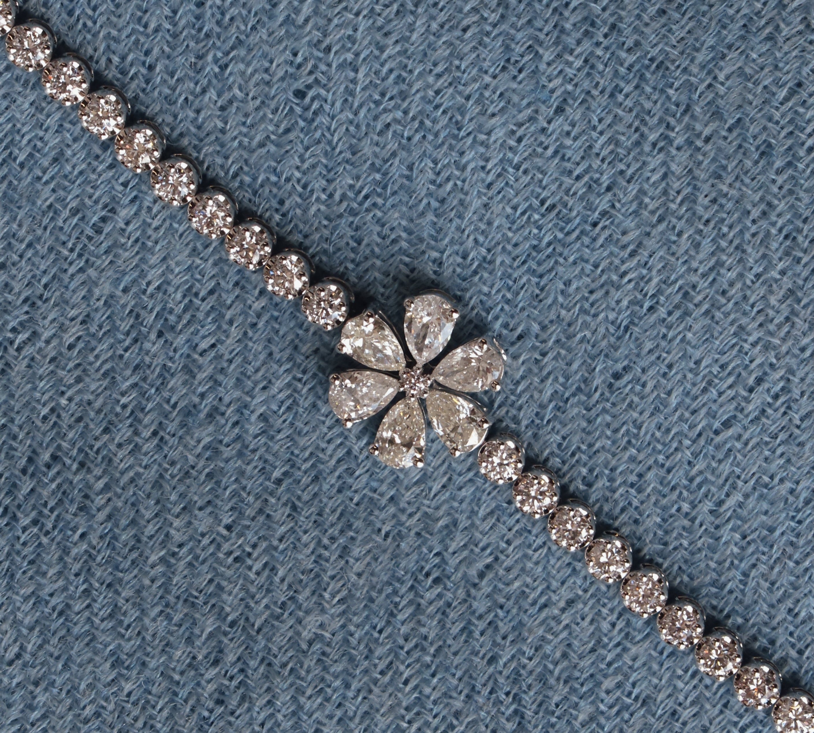 Gold Flower Tennis Bracelet by Monisha Melwani