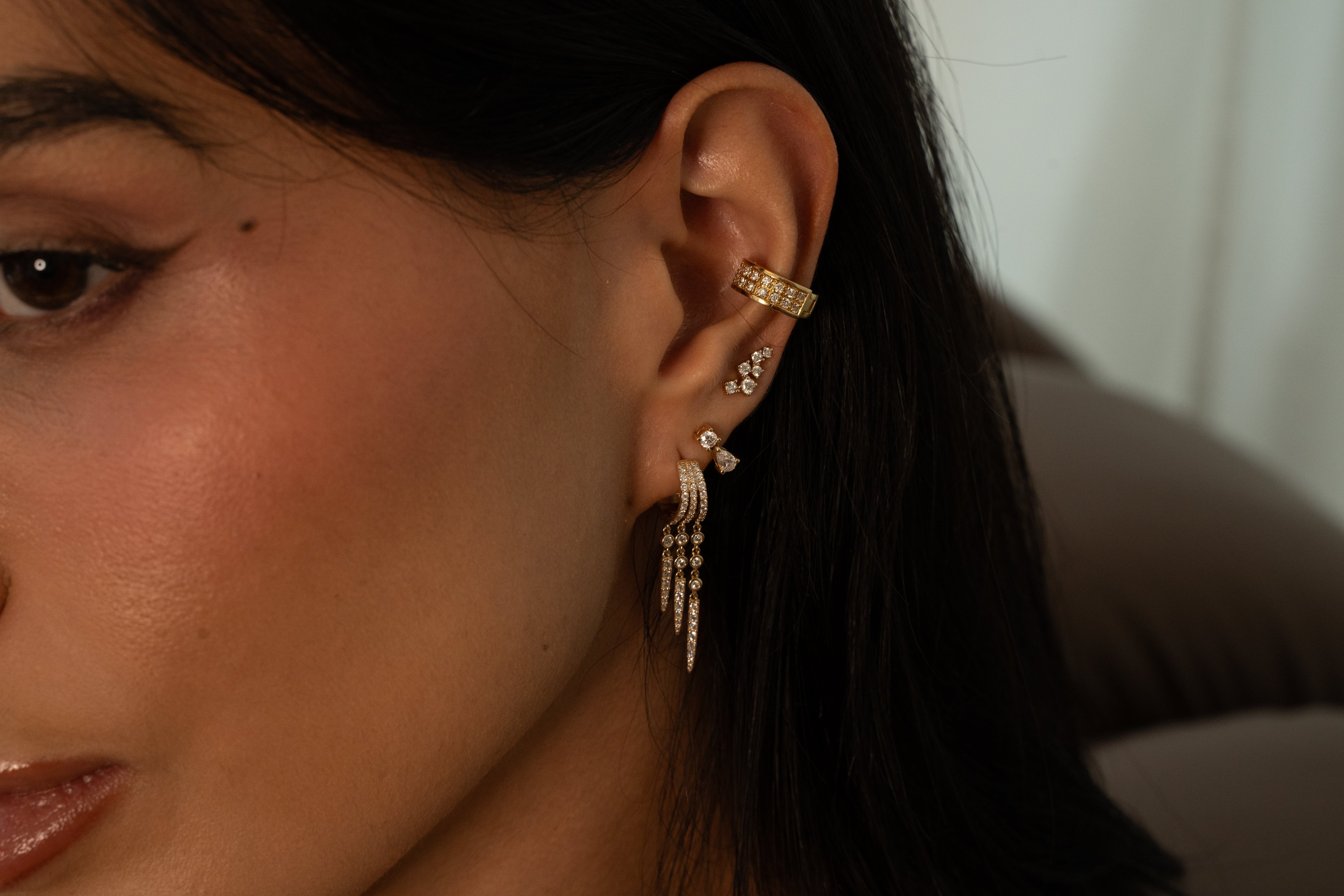Earrings collection by Monisha Melwani Jewelry