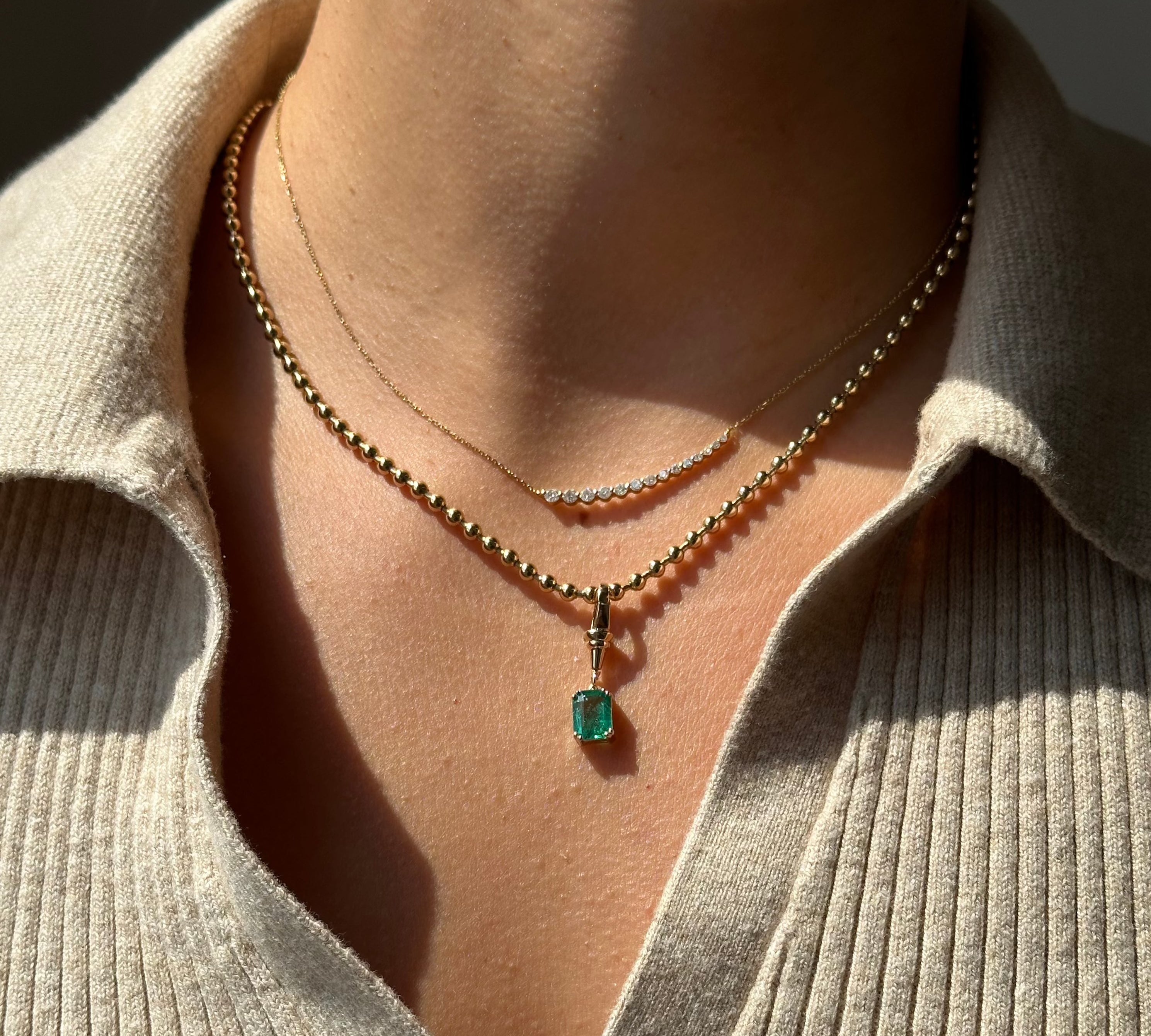 Gold Emerald Baguette Clasp Pendant