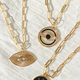 Gold Mother of Pearl Onyx Evil Eye Pendant